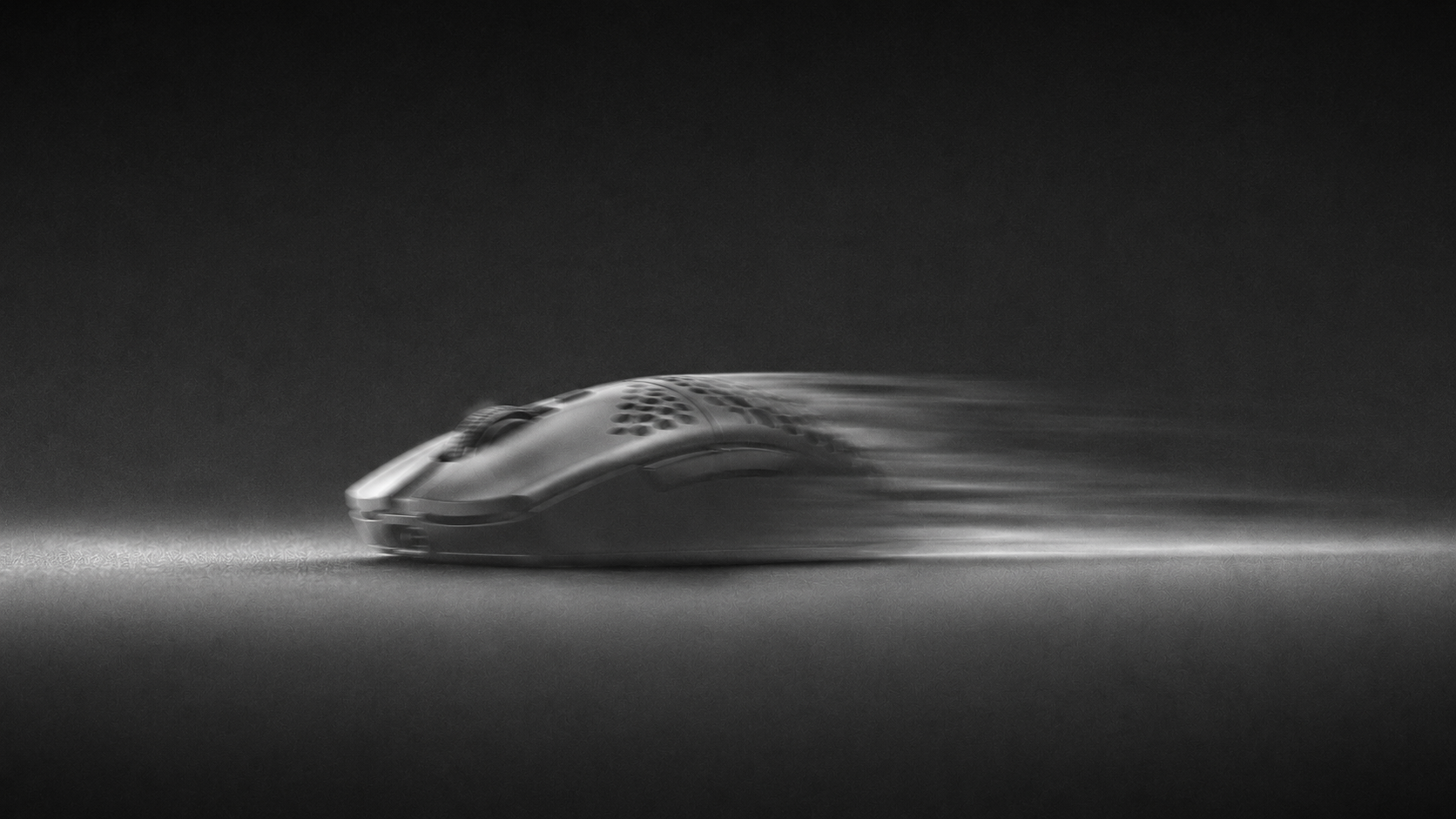 Mouse gliding at speed on TriZen glass surface